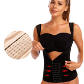 Woman wearing a black waist trainer with detailed buckle design on a white background